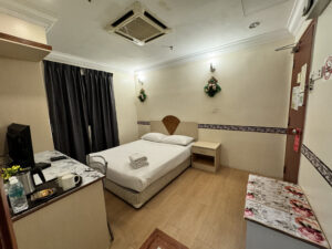 Welcome to our budget-friendly standard hotel room designed for simplicity and comfort. This cozy space prioritizes cleanliness, ensuring you enjoy a pristine environment during your stay.